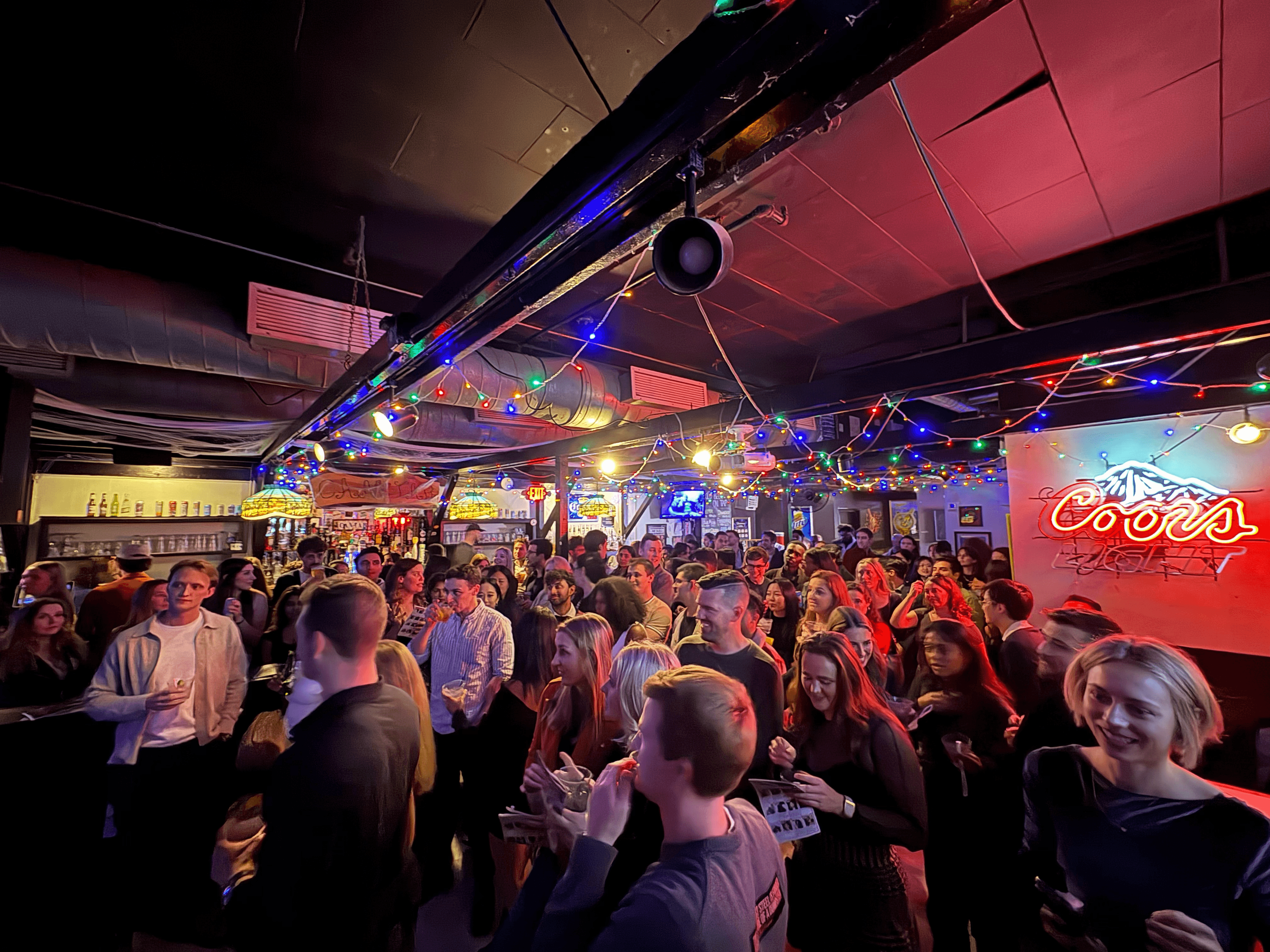 Guests mingling at a Meet Market event