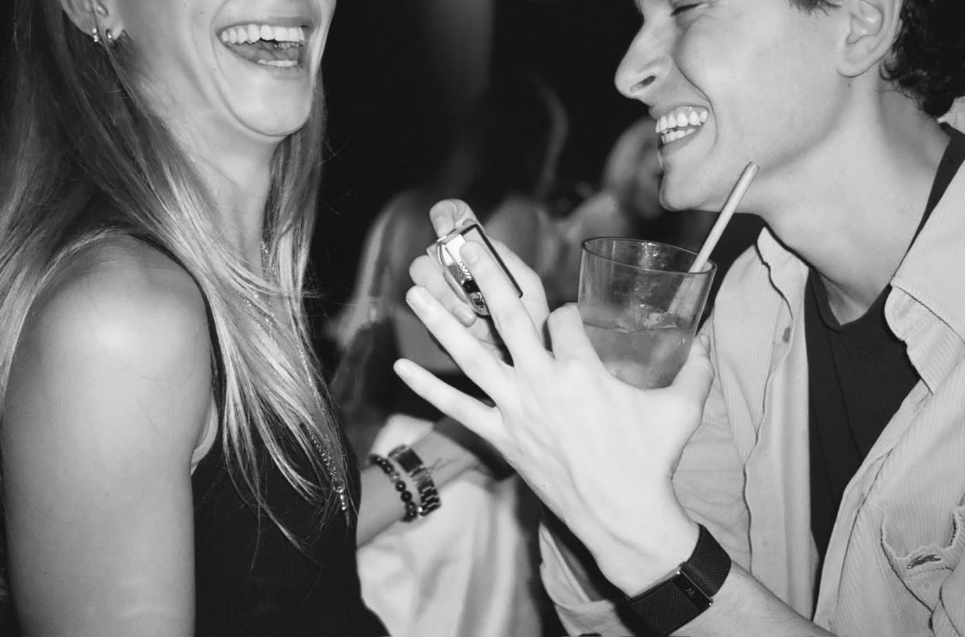 A couple laughing at a Meet Market event